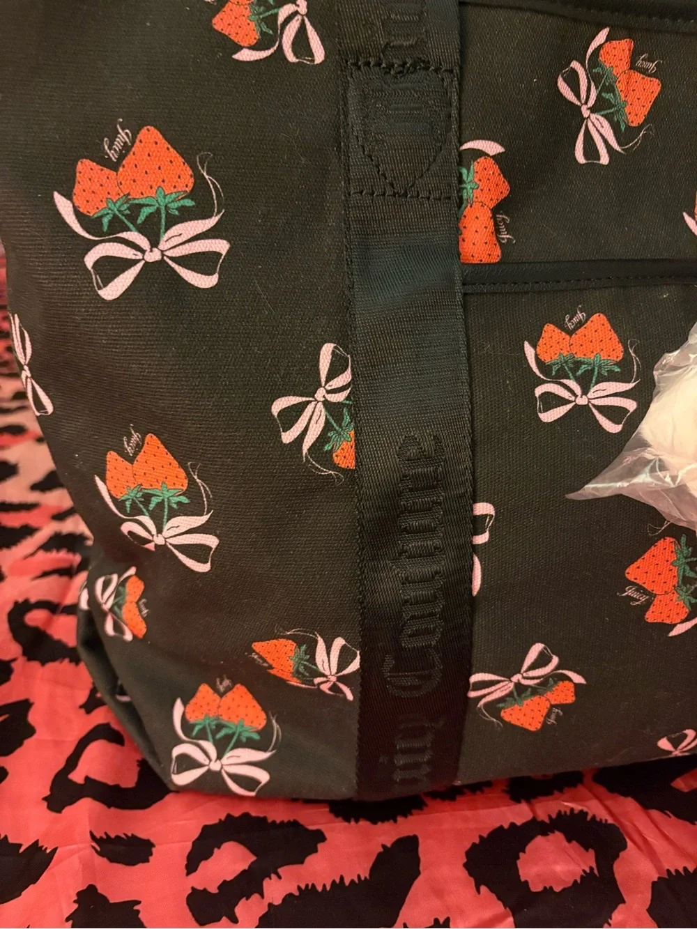 Black juicy couture tote bag with bag charms( super cute for back to school)